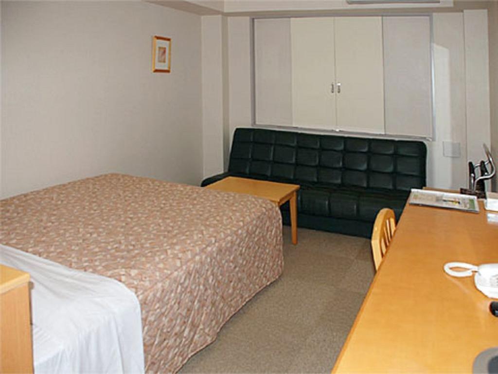 Best Inn Uozu Habitación foto